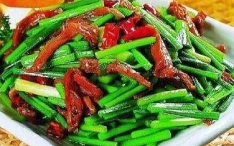 韭菜花炒肉丝的家常做法（韭菜炒肉怎么炒好吃）