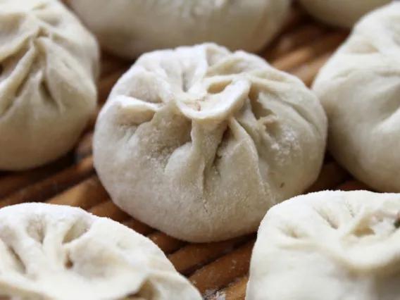 包饺子的教程_做包子教程全过程-8